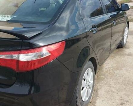 Чорний Кіа Ріо, об'ємом двигуна 1.6 л та пробігом 150 тис. км за 8000 $, фото 5 на Automoto.ua