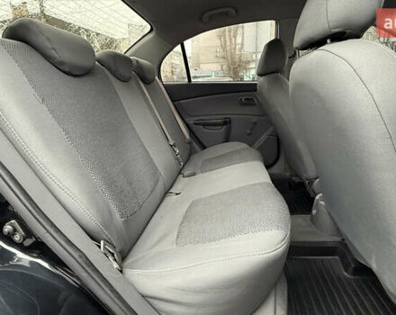 Черный Киа Рио, объемом двигателя 1.4 л и пробегом 100 тыс. км за 5000 $, фото 21 на Automoto.ua