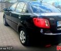 Черный Киа Рио, объемом двигателя 1.4 л и пробегом 49 тыс. км за 4800 $, фото 2 на Automoto.ua