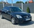 Чорний Кіа Ріо, об'ємом двигуна 1.4 л та пробігом 50 тис. км за 4899 $, фото 3 на Automoto.ua