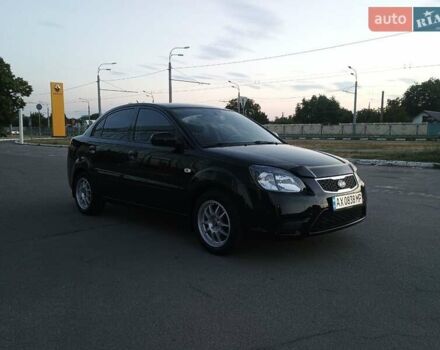 Черный Киа Рио, объемом двигателя 1.4 л и пробегом 150 тыс. км за 4500 $, фото 2 на Automoto.ua