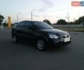Черный Киа Рио, объемом двигателя 1.4 л и пробегом 150 тыс. км за 4500 $, фото 2 на Automoto.ua