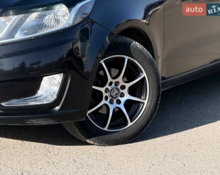 Черный Киа Рио, объемом двигателя 1.4 л и пробегом 162 тыс. км за 7700 $, фото 4 на Automoto.ua