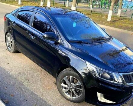 Черный Киа Рио, объемом двигателя 1.4 л и пробегом 1 тыс. км за 7100 $, фото 4 на Automoto.ua