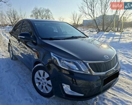 Черный Киа Рио, объемом двигателя 1.59 л и пробегом 231 тыс. км за 7100 $, фото 1 на Automoto.ua