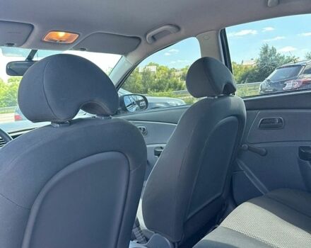 Чорний Кіа Ріо, об'ємом двигуна 1.4 л та пробігом 50 тис. км за 4899 $, фото 9 на Automoto.ua