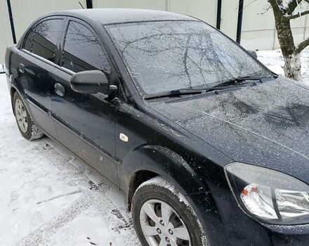 Чорний Кіа Ріо, об'ємом двигуна 1.4 л та пробігом 100 тис. км за 5800 $, фото 1 на Automoto.ua