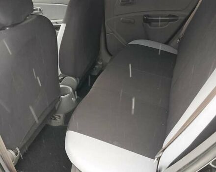 Чорний Кіа Ріо, об'ємом двигуна 1.4 л та пробігом 100 тис. км за 5800 $, фото 4 на Automoto.ua