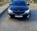 Черный Киа Рио, объемом двигателя 1.4 л и пробегом 1 тыс. км за 7100 $, фото 2 на Automoto.ua