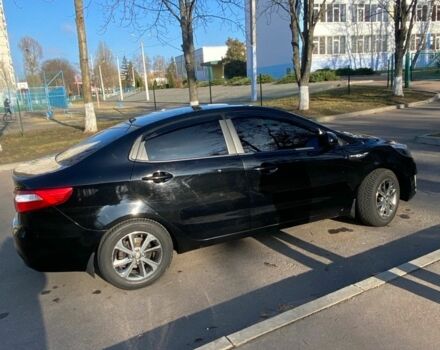 Черный Киа Рио, объемом двигателя 1.4 л и пробегом 135 тыс. км за 6700 $, фото 7 на Automoto.ua