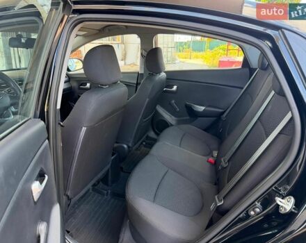 Чорний Кіа Ріо, об'ємом двигуна 1.4 л та пробігом 65 тис. км за 8300 $, фото 4 на Automoto.ua
