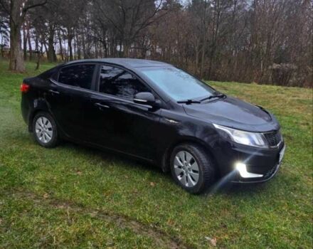 Черный Киа Рио, объемом двигателя 1.6 л и пробегом 231 тыс. км за 5850 $, фото 1 на Automoto.ua