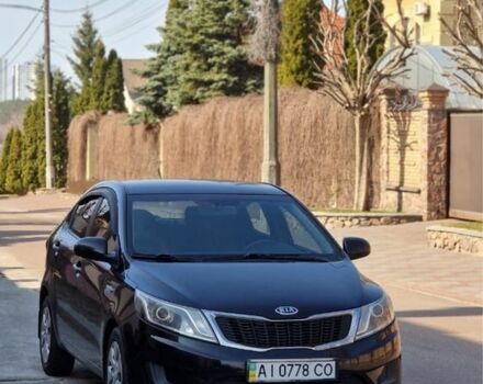 Черный Киа Рио, объемом двигателя 1.4 л и пробегом 180 тыс. км за 6500 $, фото 1 на Automoto.ua