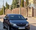 Черный Киа Рио, объемом двигателя 1.4 л и пробегом 180 тыс. км за 6500 $, фото 1 на Automoto.ua
