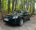Черный Киа Рио, объемом двигателя 1.4 л и пробегом 270 тыс. км за 4499 $, фото 1 на Automoto.ua