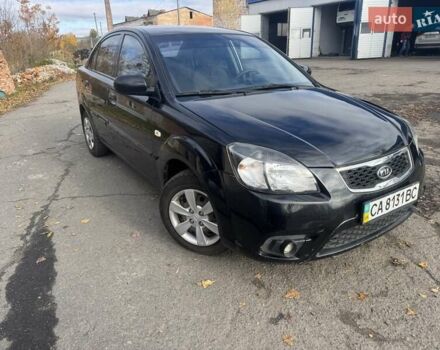 Чорний Кіа Ріо, об'ємом двигуна 1.4 л та пробігом 105 тис. км за 4400 $, фото 3 на Automoto.ua