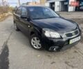Чорний Кіа Ріо, об'ємом двигуна 1.4 л та пробігом 105 тис. км за 4400 $, фото 3 на Automoto.ua
