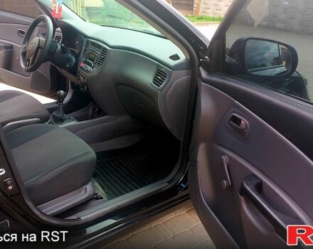 Черный Киа Рио, объемом двигателя 1.4 л и пробегом 49 тыс. км за 4800 $, фото 4 на Automoto.ua