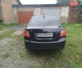 Черный Киа Рио, объемом двигателя 1.4 л и пробегом 133 тыс. км за 5900 $, фото 5 на Automoto.ua