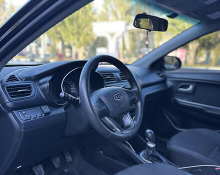 Чорний Кіа Ріо, об'ємом двигуна 1.4 л та пробігом 183 тис. км за 6200 $, фото 7 на Automoto.ua