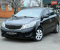 Черный Киа Рио, объемом двигателя 1.4 л и пробегом 193 тыс. км за 6599 $, фото 1 на Automoto.ua