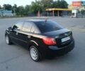 Черный Киа Рио, объемом двигателя 1.4 л и пробегом 150 тыс. км за 4500 $, фото 3 на Automoto.ua
