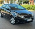 Чорний Кіа Ріо, об'ємом двигуна 1.4 л та пробігом 65 тис. км за 8300 $, фото 14 на Automoto.ua