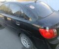 Черный Киа Рио, объемом двигателя 1.4 л и пробегом 160 тыс. км за 2608 $, фото 5 на Automoto.ua