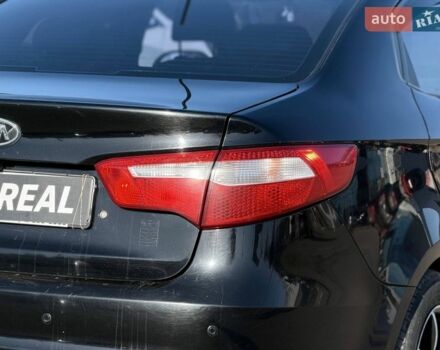 Черный Киа Рио, объемом двигателя 1.4 л и пробегом 162 тыс. км за 7700 $, фото 18 на Automoto.ua