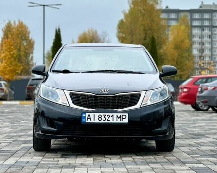 Черный Киа Рио, объемом двигателя 1.4 л и пробегом 180 тыс. км за 5900 $, фото 2 на Automoto.ua