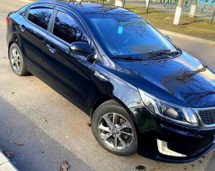 Чорний Кіа Ріо, об'ємом двигуна 1.4 л та пробігом 1350 тис. км за 7100 $, фото 5 на Automoto.ua