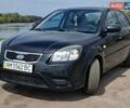 Чорний Кіа Ріо, об'ємом двигуна 1.4 л та пробігом 183 тис. км за 5500 $, фото 1 на Automoto.ua