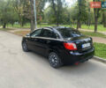 Черный Киа Рио, объемом двигателя 1.6 л и пробегом 125 тыс. км за 4950 $, фото 5 на Automoto.ua