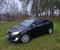 Черный Киа Рио, объемом двигателя 1.6 л и пробегом 231 тыс. км за 5850 $, фото 1 на Automoto.ua