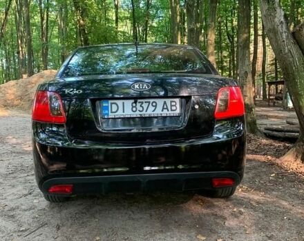 Чорний Кіа Ріо, об'ємом двигуна 1.4 л та пробігом 275 тис. км за 4700 $, фото 2 на Automoto.ua