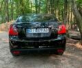 Чорний Кіа Ріо, об'ємом двигуна 1.4 л та пробігом 275 тис. км за 4700 $, фото 2 на Automoto.ua