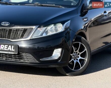Черный Киа Рио, объемом двигателя 1.4 л и пробегом 162 тыс. км за 7700 $, фото 2 на Automoto.ua