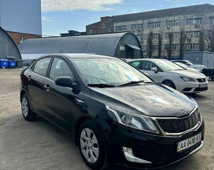 Чорний Кіа Ріо, об'ємом двигуна 1.6 л та пробігом 249 тис. км за 7200 $, фото 1 на Automoto.ua
