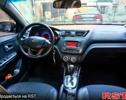 Чорний Кіа Ріо, об'ємом двигуна 1.6 л та пробігом 173 тис. км за 5800 $, фото 3 на Automoto.ua