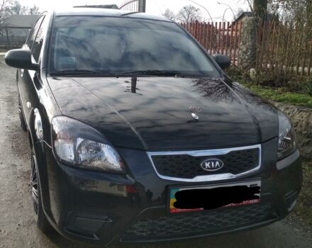 Черный Киа Рио, объемом двигателя 1.4 л и пробегом 25 тыс. км за 7000 $, фото 2 на Automoto.ua