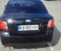 Черный Киа Рио, объемом двигателя 1.4 л и пробегом 224 тыс. км за 4600 $, фото 5 на Automoto.ua