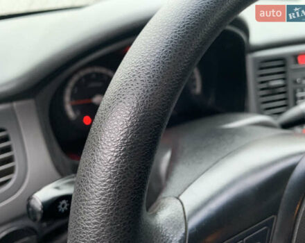 Черный Киа Рио, объемом двигателя 1.4 л и пробегом 105 тыс. км за 4100 $, фото 6 на Automoto.ua