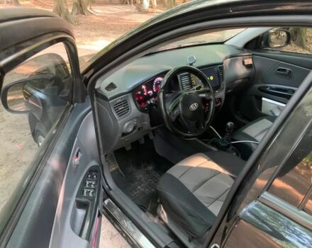 Черный Киа Рио, объемом двигателя 1.4 л и пробегом 270 тыс. км за 4499 $, фото 7 на Automoto.ua