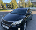 Чорний Кіа Ріо, об'ємом двигуна 1.4 л та пробігом 183 тис. км за 6200 $, фото 1 на Automoto.ua