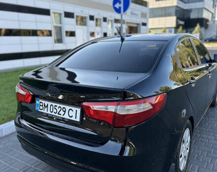 Чорний Кіа Ріо, об'ємом двигуна 1.4 л та пробігом 183 тис. км за 6200 $, фото 4 на Automoto.ua