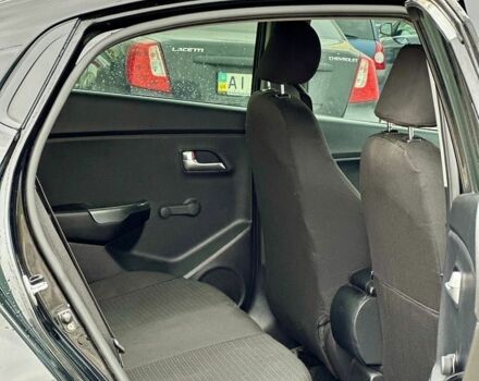 Черный Киа Рио, объемом двигателя 1.4 л и пробегом 180 тыс. км за 5900 $, фото 14 на Automoto.ua