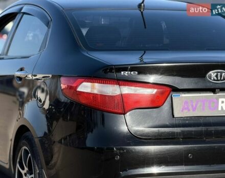 Черный Киа Рио, объемом двигателя 1.4 л и пробегом 162 тыс. км за 7700 $, фото 17 на Automoto.ua