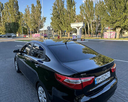 Чорний Кіа Ріо, об'ємом двигуна 1.4 л та пробігом 183 тис. км за 6200 $, фото 5 на Automoto.ua