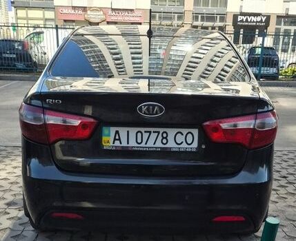 Черный Киа Рио, объемом двигателя 1.4 л и пробегом 362 тыс. км за 5500 $, фото 1 на Automoto.ua