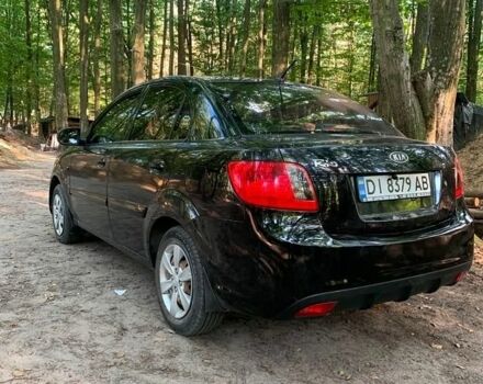 Чорний Кіа Ріо, об'ємом двигуна 1.4 л та пробігом 275 тис. км за 4700 $, фото 3 на Automoto.ua